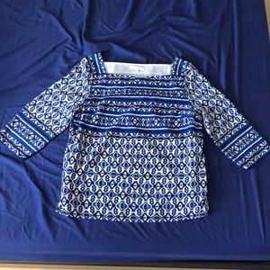 Blue and white patterned blouse